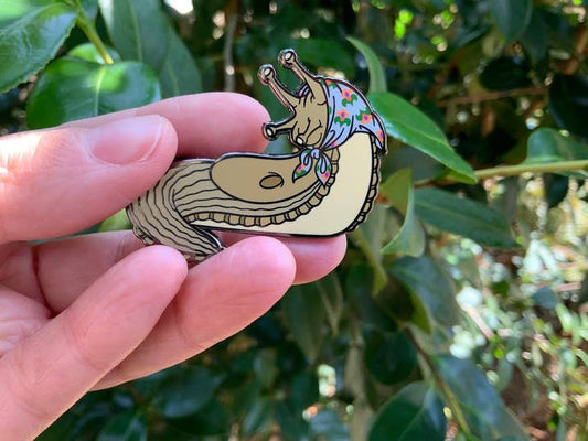 Babushka slug enamel pin