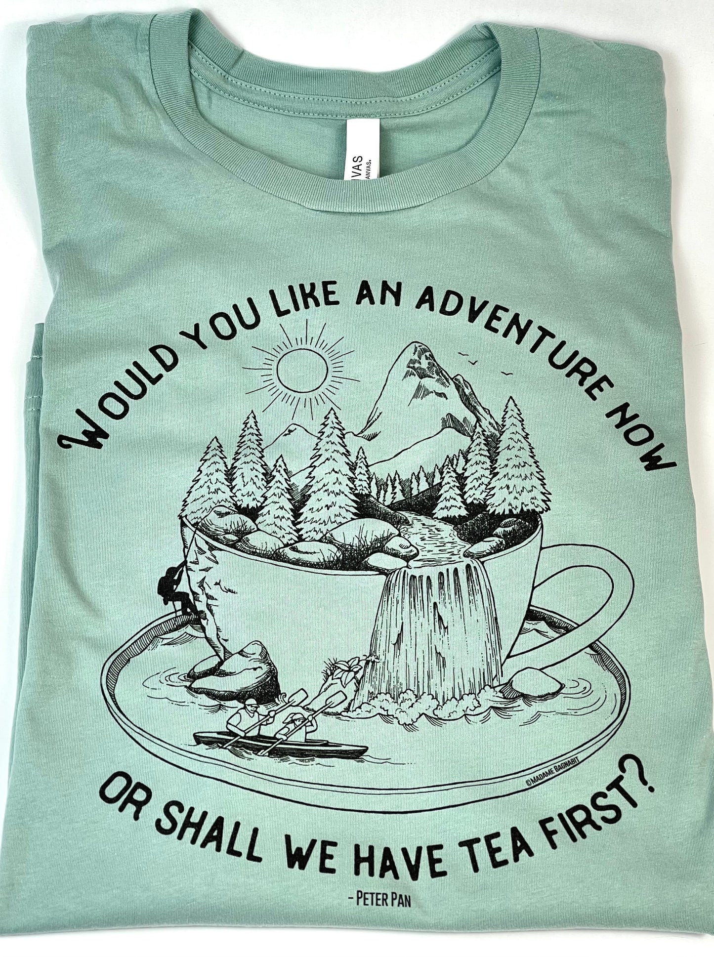 Light blue t-shirt with nature-themed graphic and text on a white background
