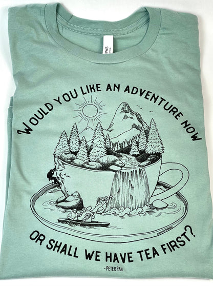 Light blue t-shirt with nature-themed graphic and text on a white background