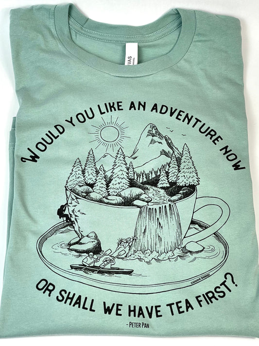 Light blue t-shirt with nature-themed graphic and text on a white background