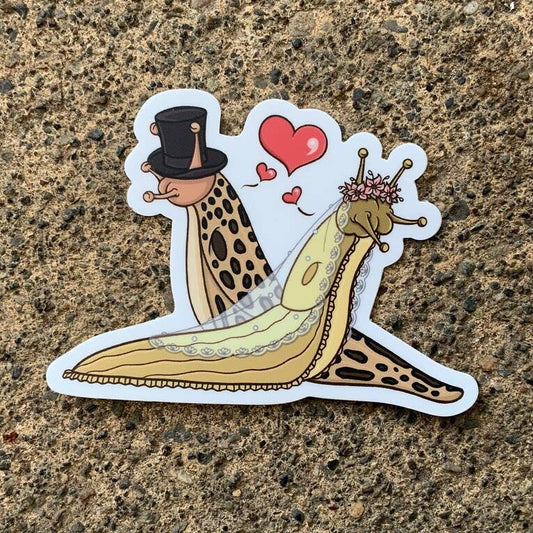 Sticker of two slugs in a romantic pose on a textured surface
