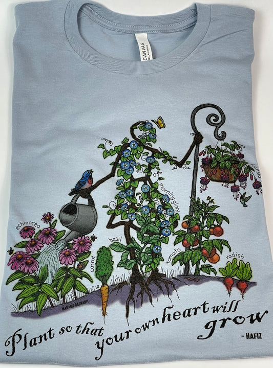 Light blue t-shirt with garden-themed design and text on a white background