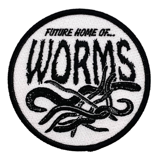 Circular patch with text 'Future Home of Worms' and worm illustrations on a white background