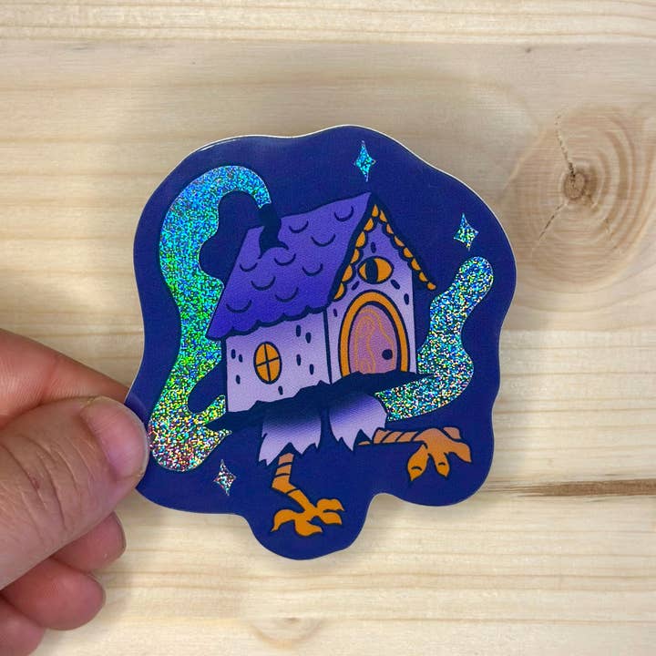 holographic baba yaga hut sticker