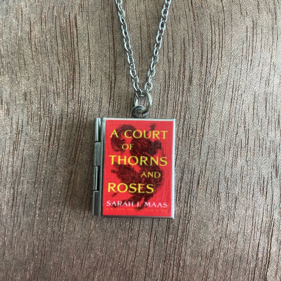 A Court of Thorns and Roses locket necklace