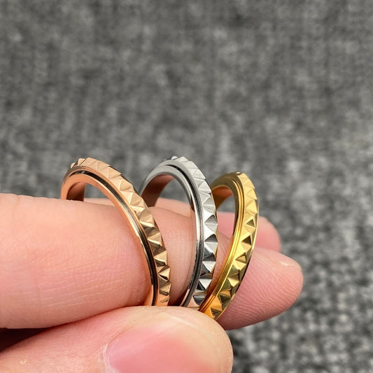 Dainty beveled spinner ring