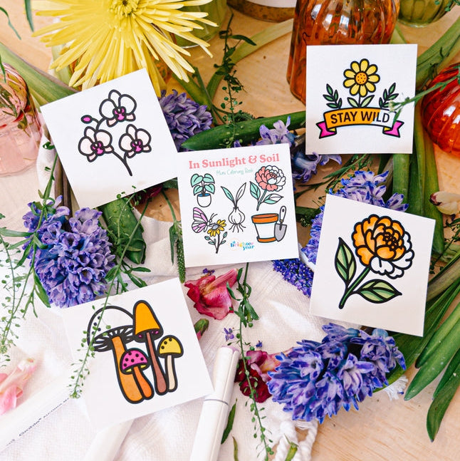 Floral-themed images on white cards with a natural background of flowers and plants.