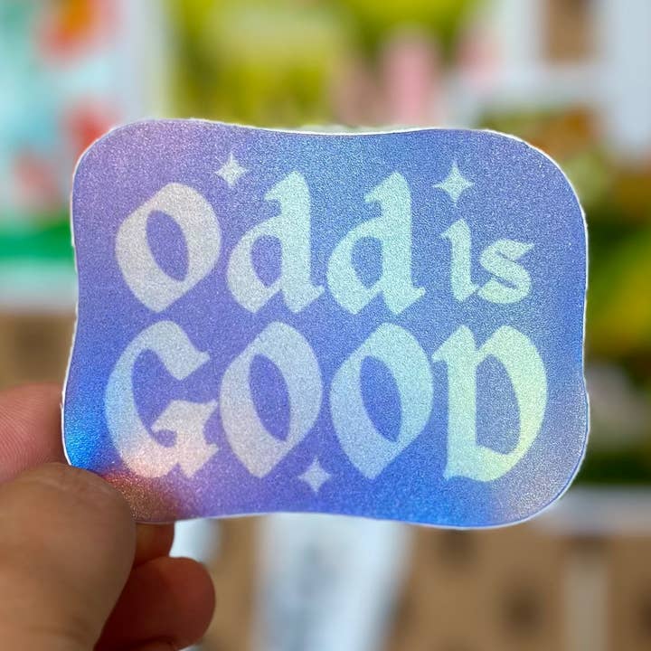 holographic sticker that says Odd is Good