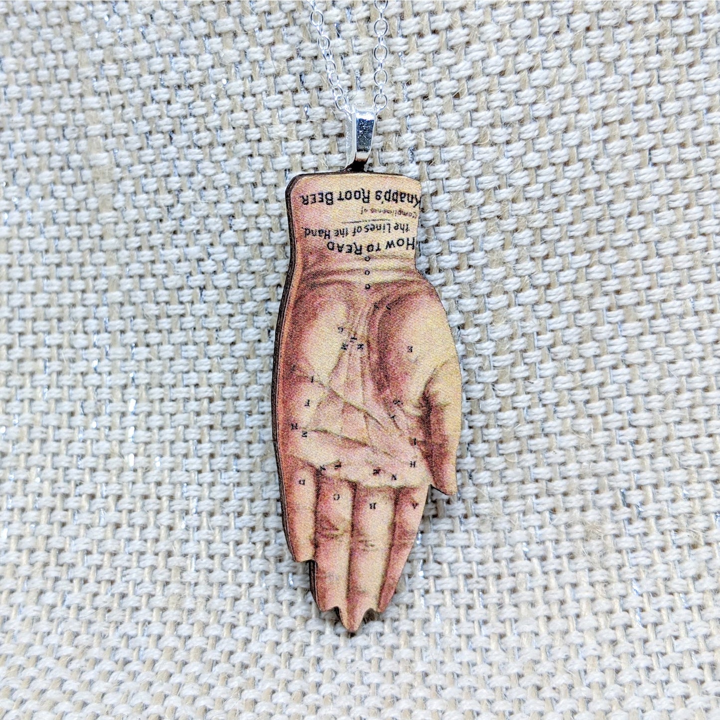 Palmistry hand necklace